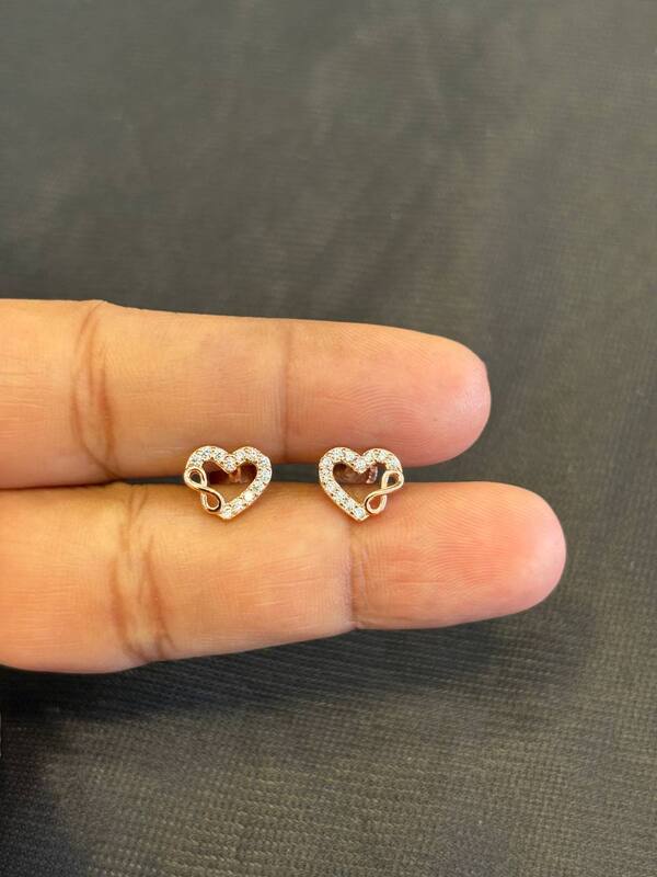 Silver heart infinityy stud with rosegold finish