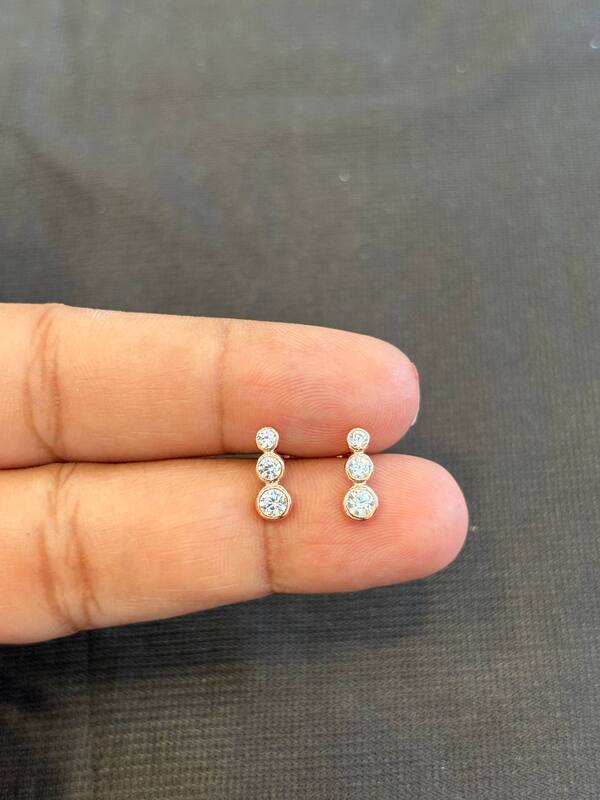 Silver tri1 stone second stud with rosegold finish