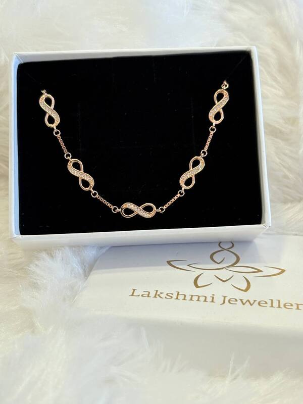 Silver multi infinity bracelet with rosegold finish
