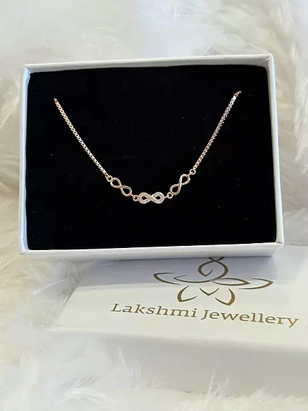Silver tri infinity bracelet with rosegold finish