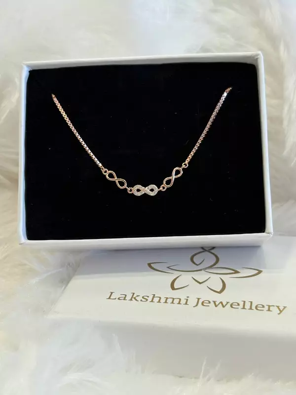 Silver tri infinity bracelet with rosegold finish