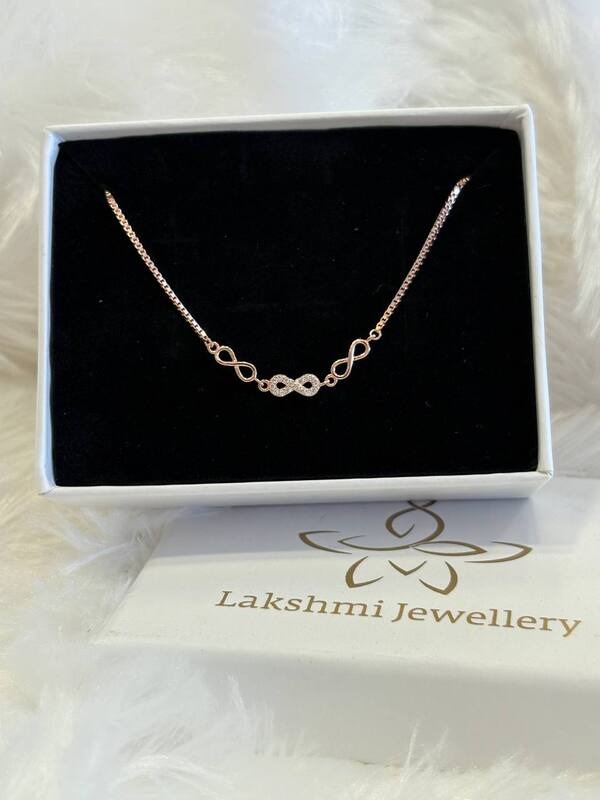 Silver tri infinity bracelet with rosegold finish