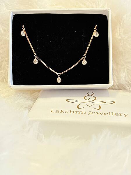 Silver white thilagam bracelet with rosegold finish