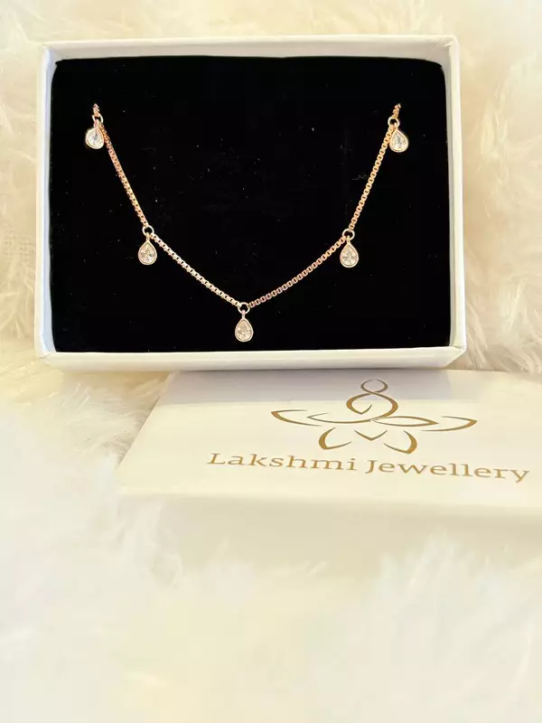 Silver white thilagam bracelet with rosegold finish