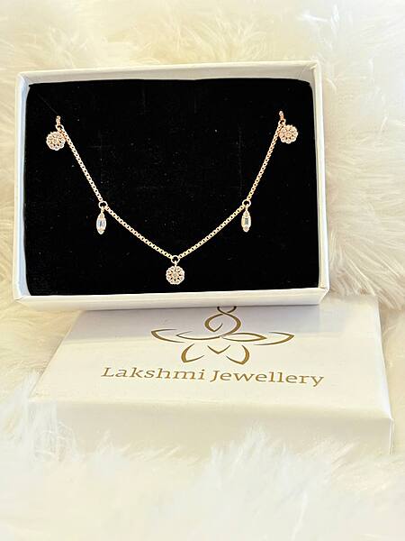 Silver round charms with hanging bracelet with rosegold finish