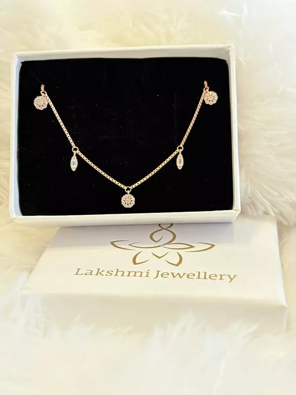 Silver round charms with hanging bracelet with rosegold finish