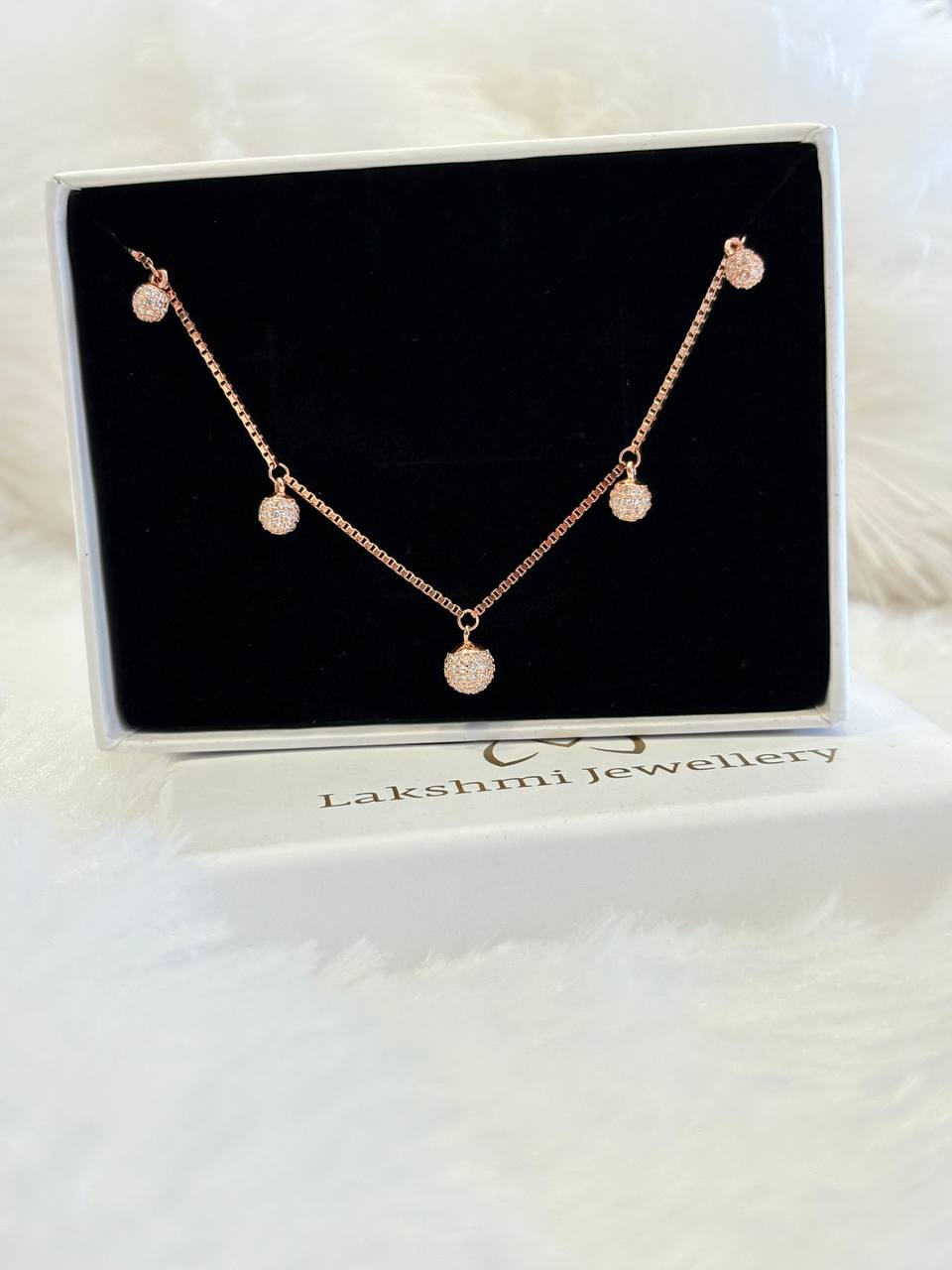 Silver ball braacelet with rosegold finish