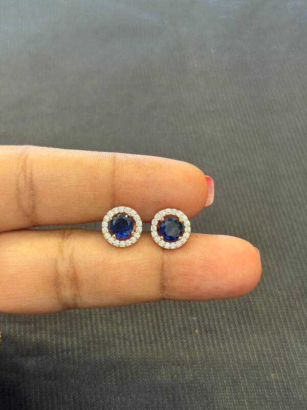 Silver blue round coated stud with rosegold finish