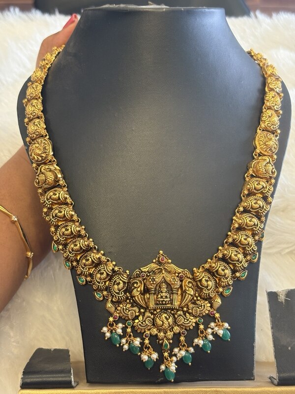 Silver lakshmi haram with antique finish