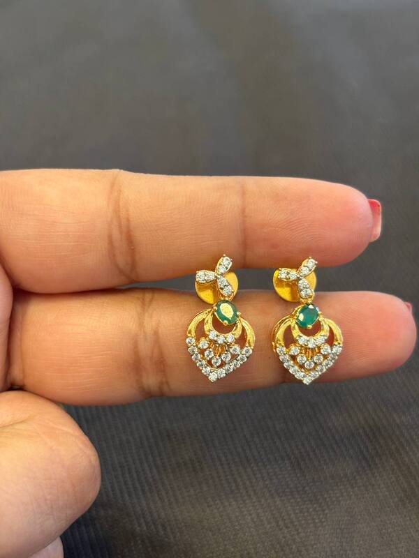 Silver millie stud with gold stud