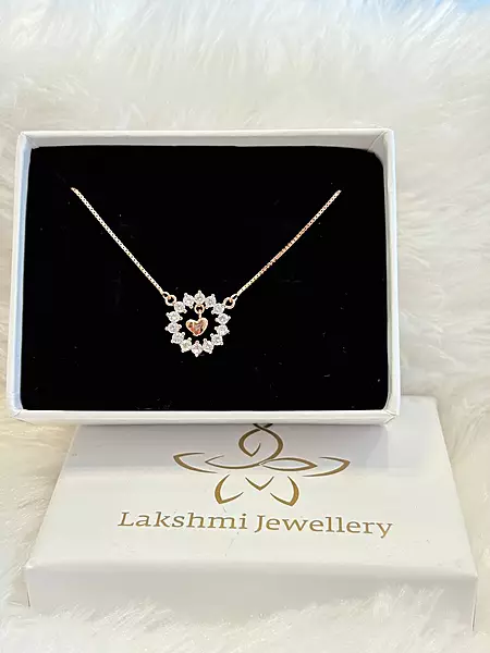 Silver karthigai stud with rosegold finish