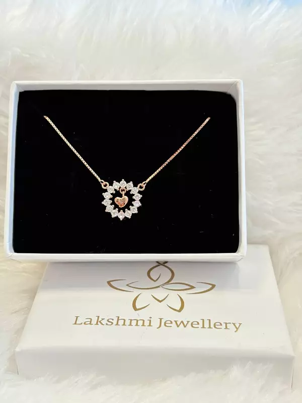 Silver karthigai stud with rosegold finish
