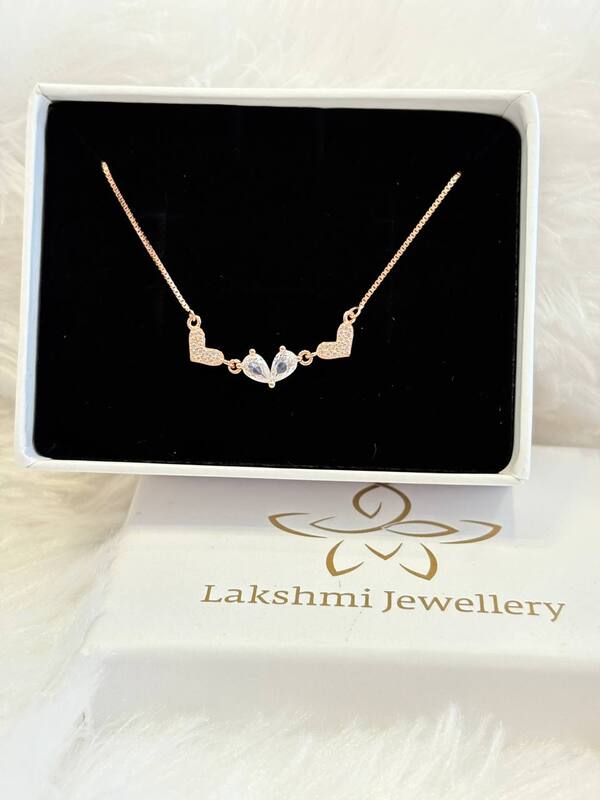 Silver triple heart chain with rosegold finish