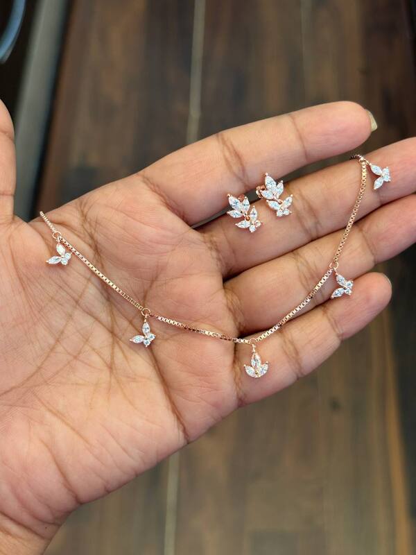 Silver white fancy butterfly charm with rosegold finish