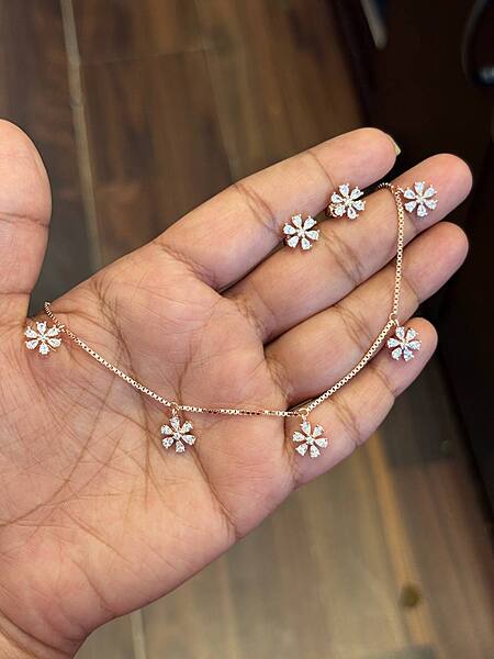 Silver flowery white charm with rosegold finish