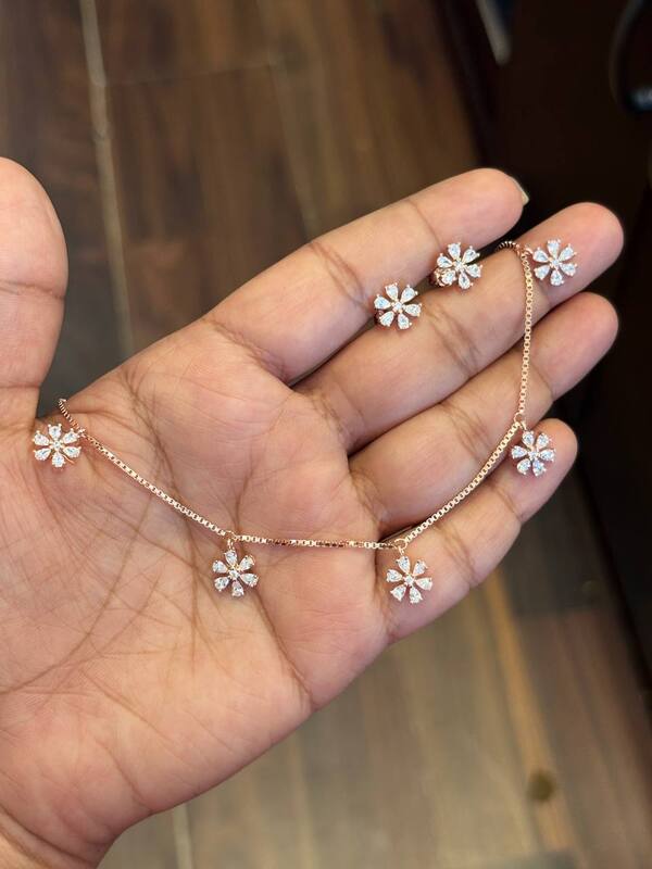 Silver flowery white charm with rosegold finish