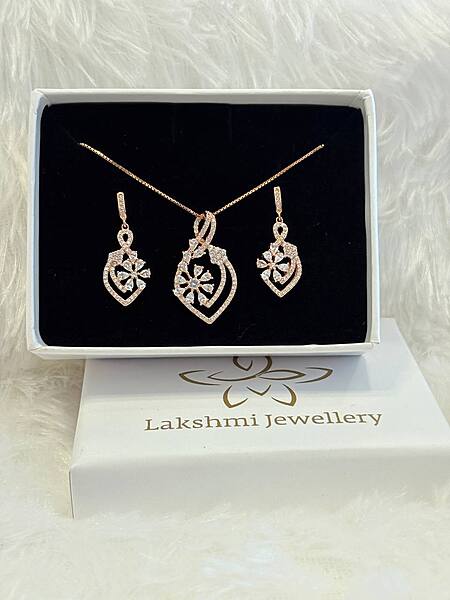 Silver marvel pedant set with rosegold finish