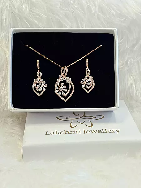 Silver marvel pedant set with rosegold finish
