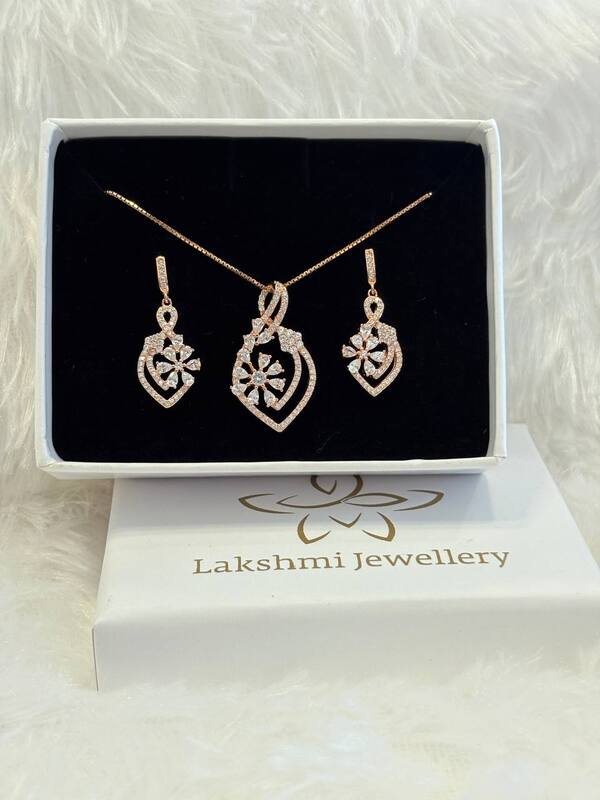 Silver marvel pedant set with rosegold finish