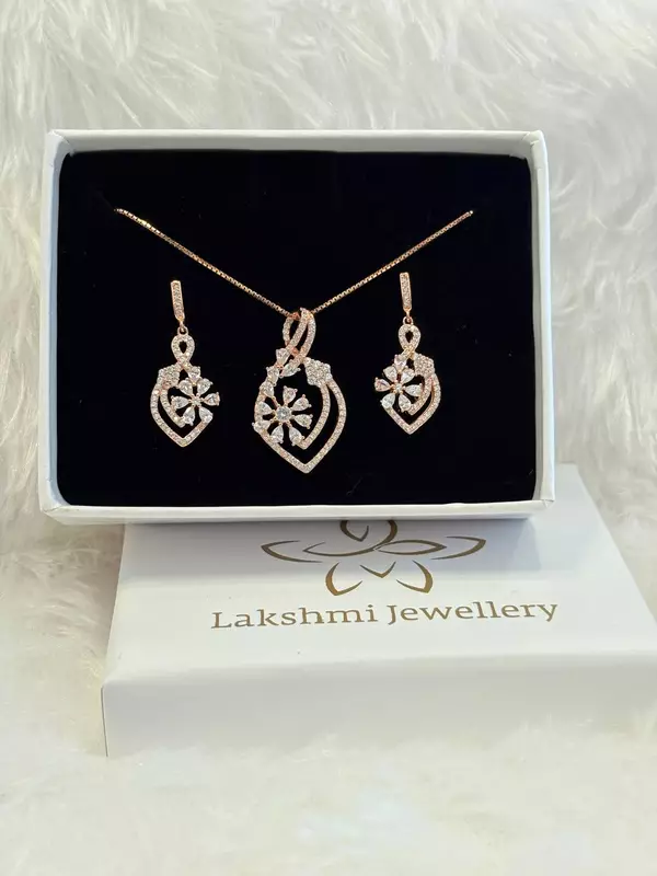 Silver marvel pedant set with rosegold finish
