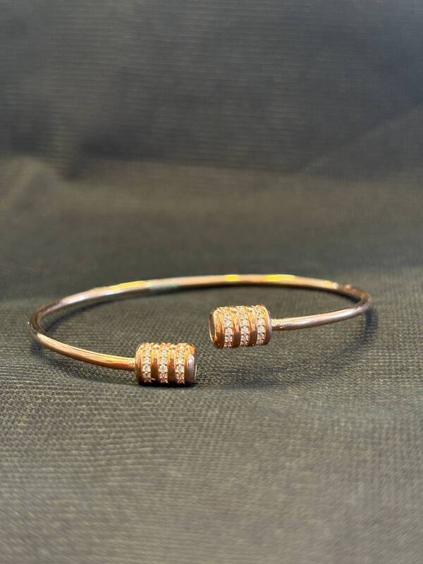 Silver anvi kada with rosegold finish