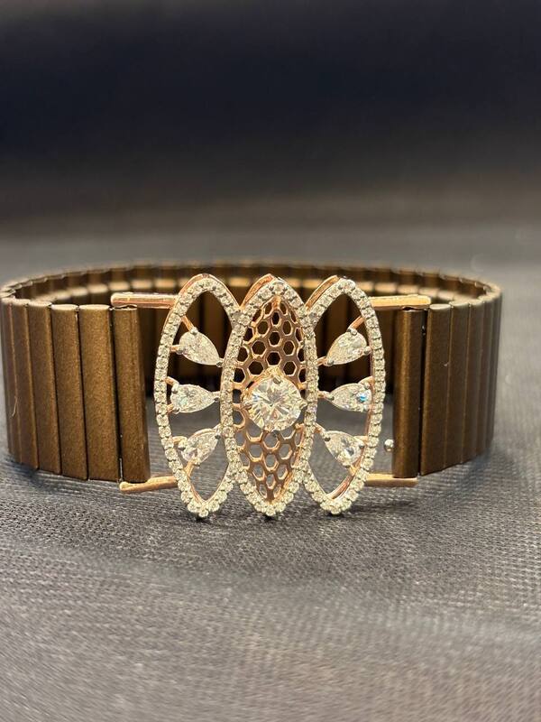 Silver maghil wrist band with rosegold finish