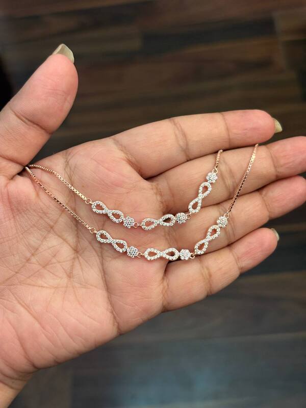 Silver infinityy flower with rosegold finish