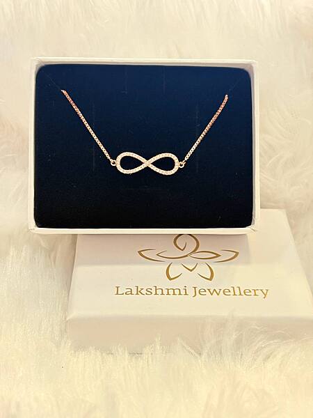 Silver infinityy bracelet with rosegold finish