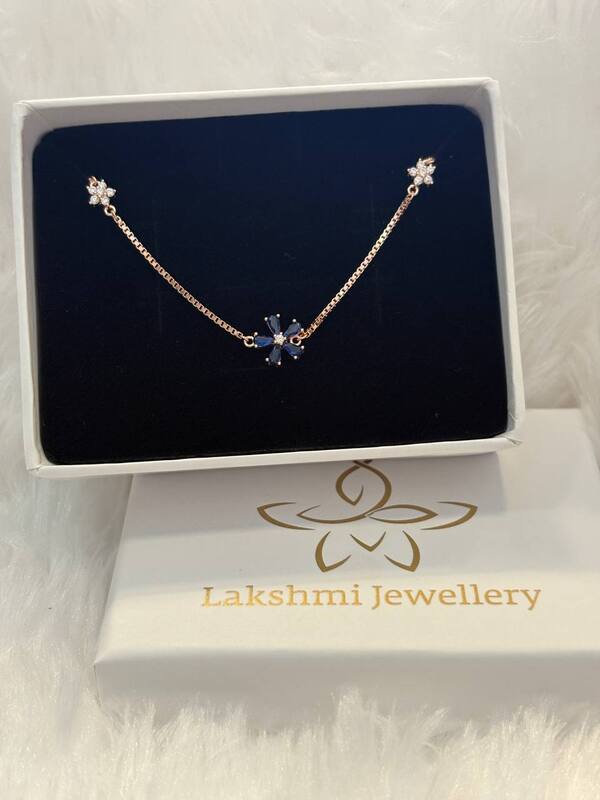 Silver blue flower bracelet with rosegold finish