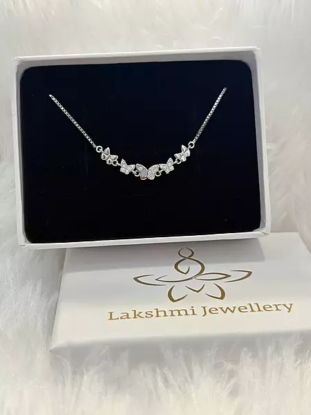 Silver multi butterfly bracelet