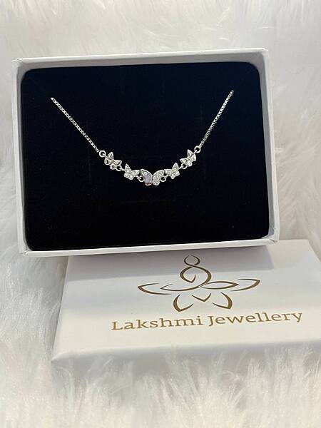 Silver multi butterfly bracelet
