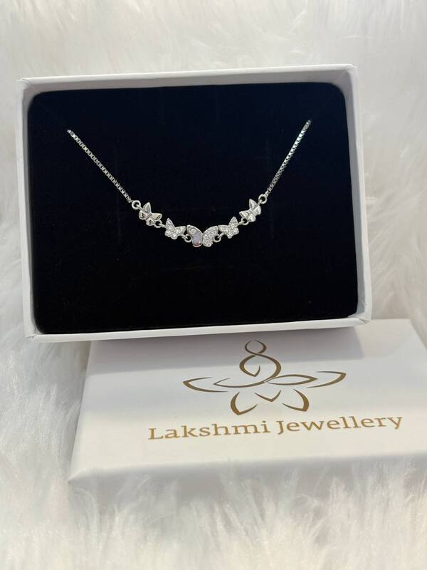 Silver multi butterfly bracelet