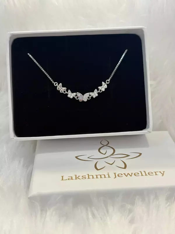 Silver multi butterfly bracelet