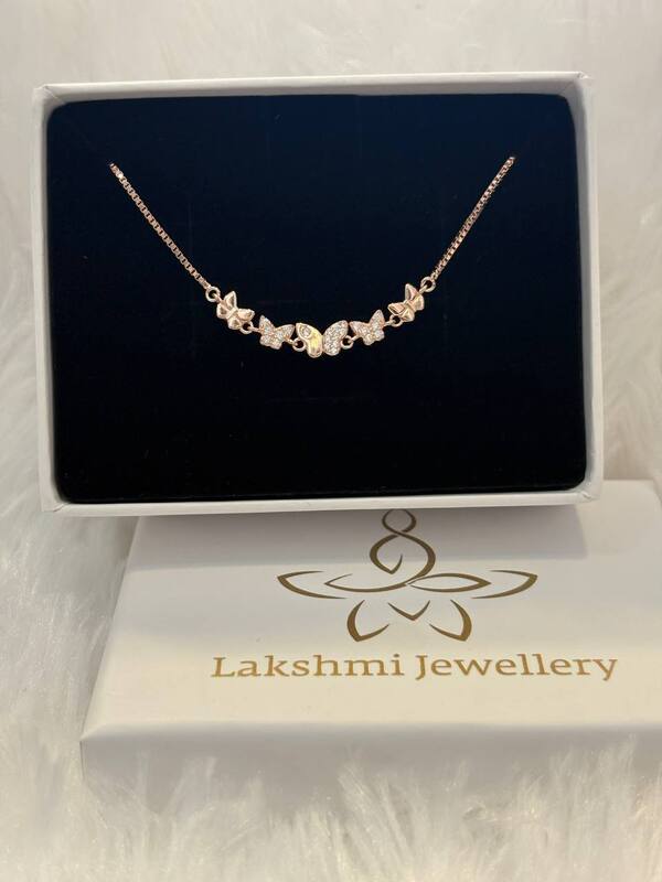 Silver butterflyy bracelet with rosegold finish