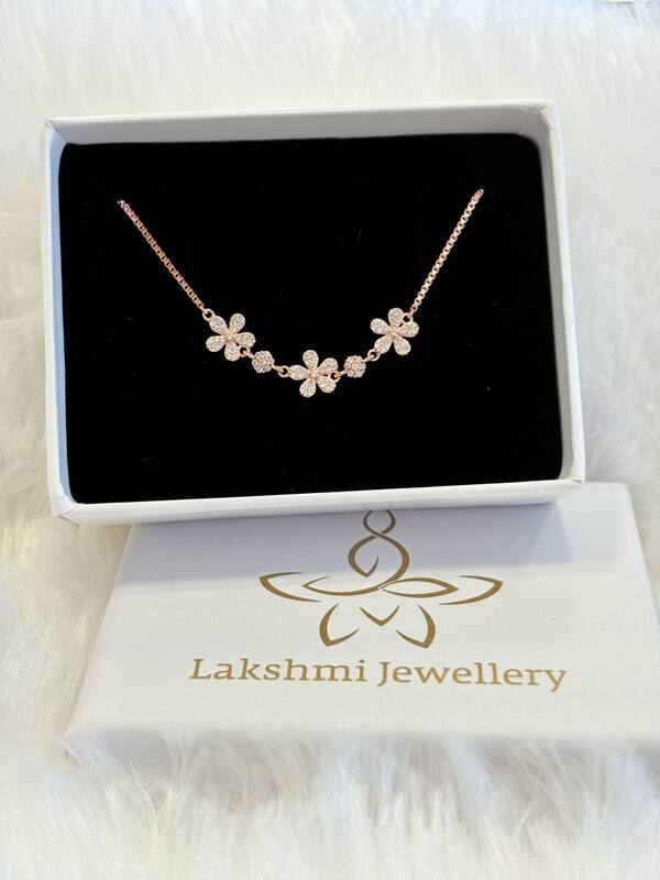 Silver triple flower bracelet with rosegold finish