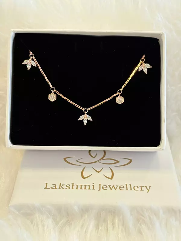 Silver flower charms bracelet with rosegold finish