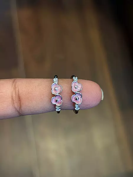 Silver poo1 toe ring