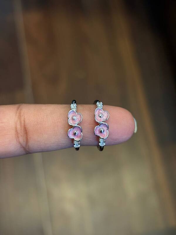 Silver poo1 toe ring
