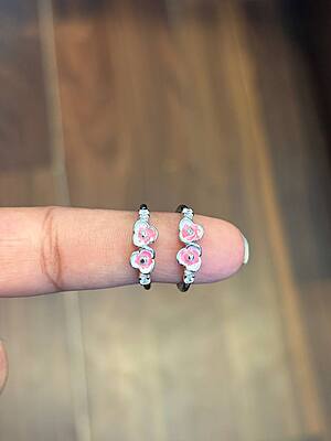 Silver poo1 toe ring