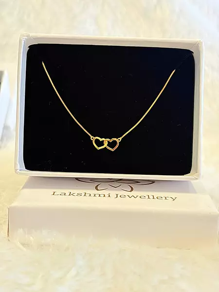 Silver doublee heart chain with gold finish