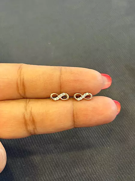 Silver infinityy second stud with rosegold finish