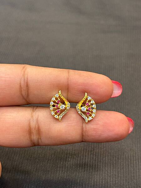Silver white with pink thilagam with gold finish