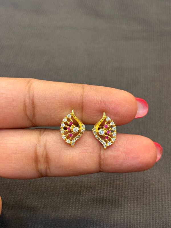 Silver white with pink thilagam with gold finish