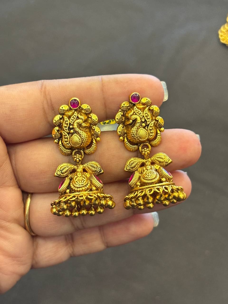 Silver annam jhumka with antique finish