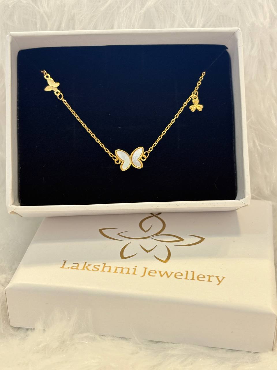 Silver butterfly casting bracelet with rosegold finish