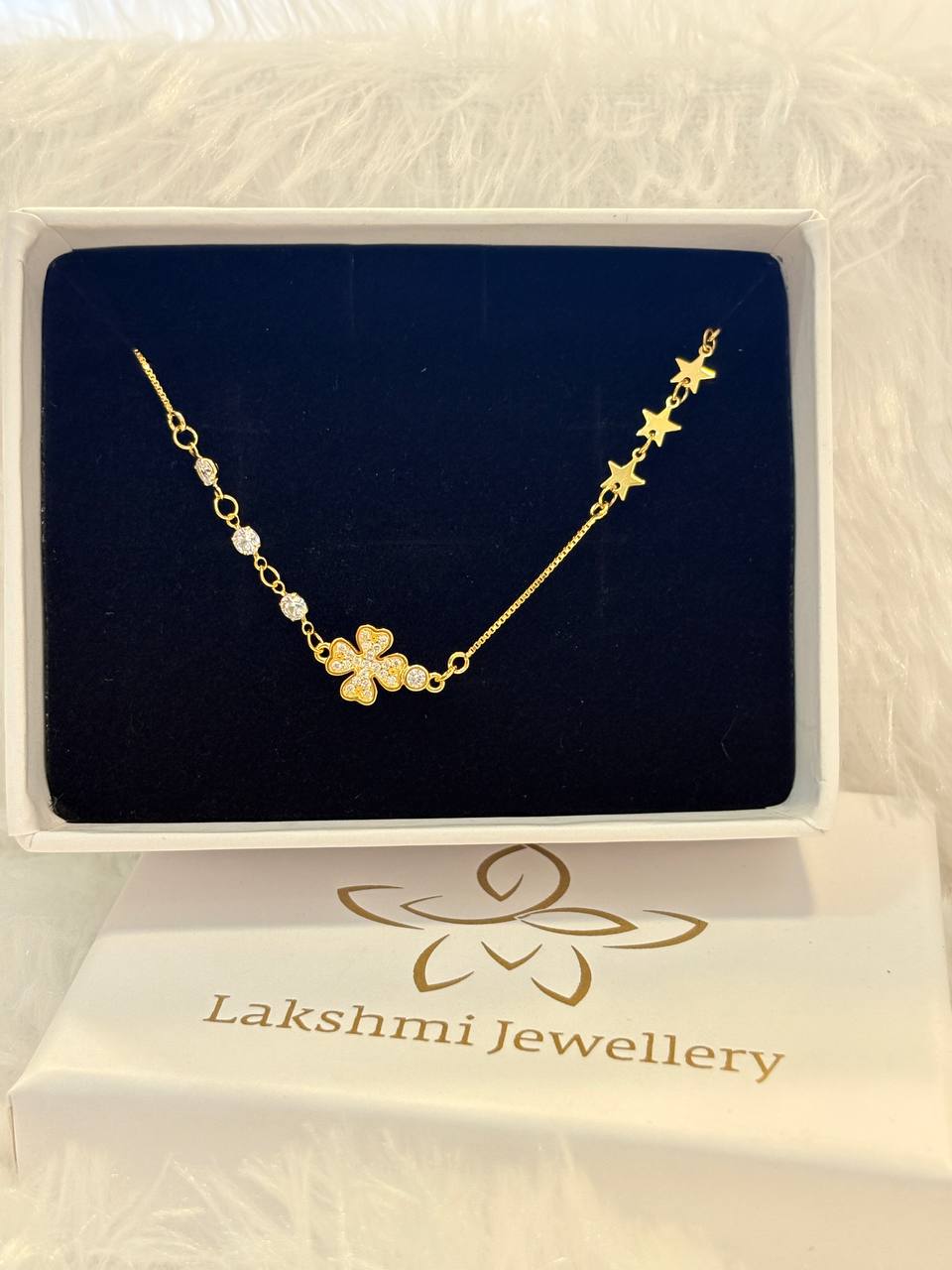 Silver flower bracelet with gold finish