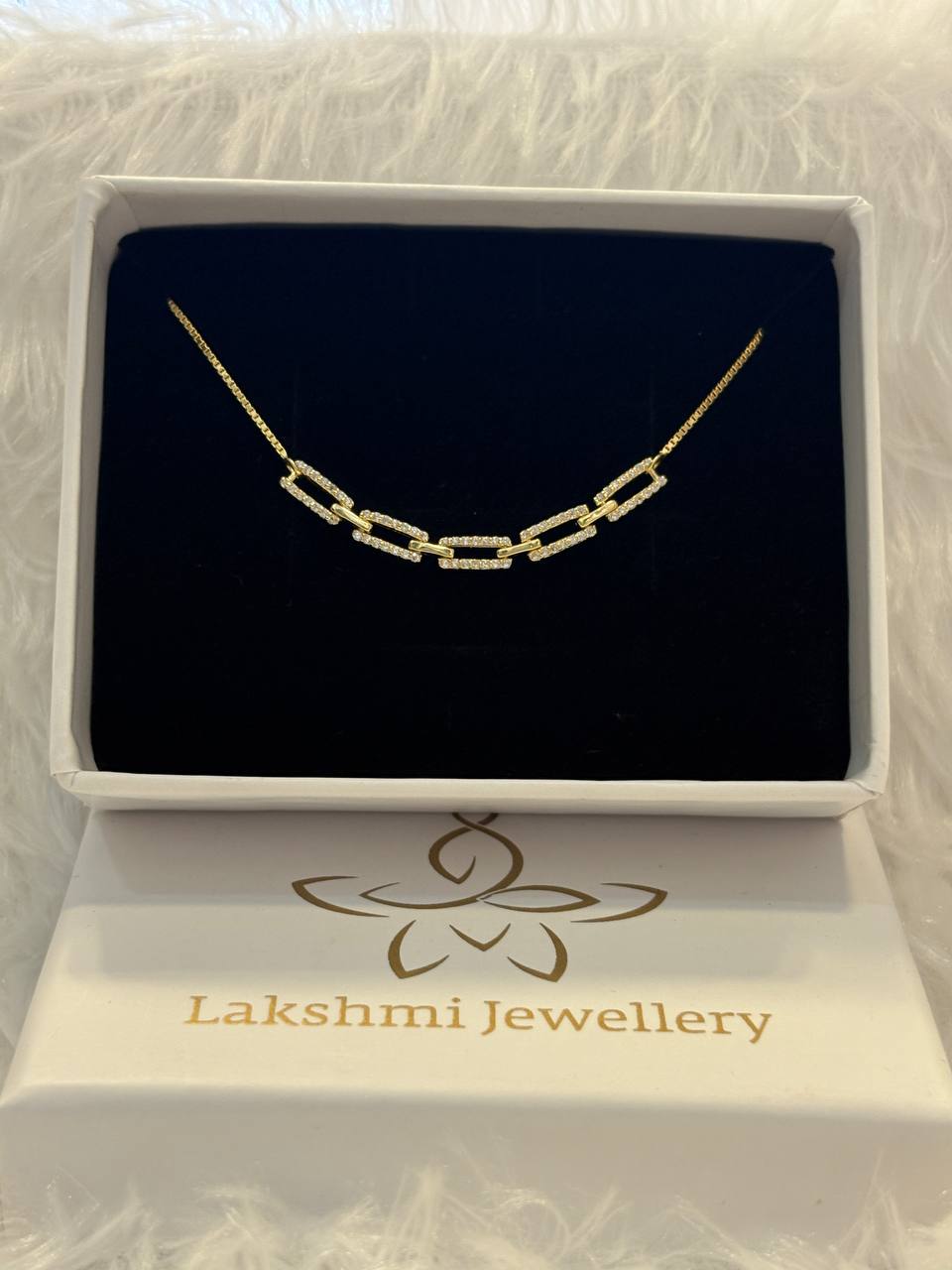 Silver link bracelet with gold finish