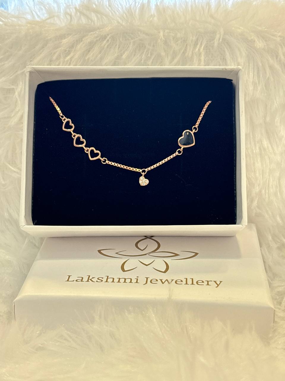 Silver black heart bracelet with rosegold finish