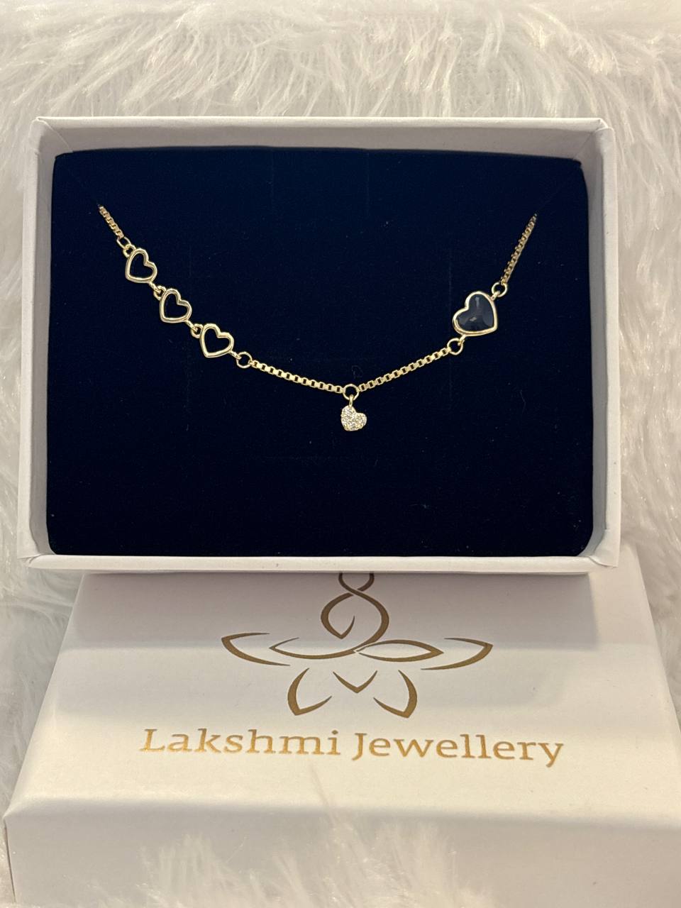 Silver black heart bracelet with gold finish