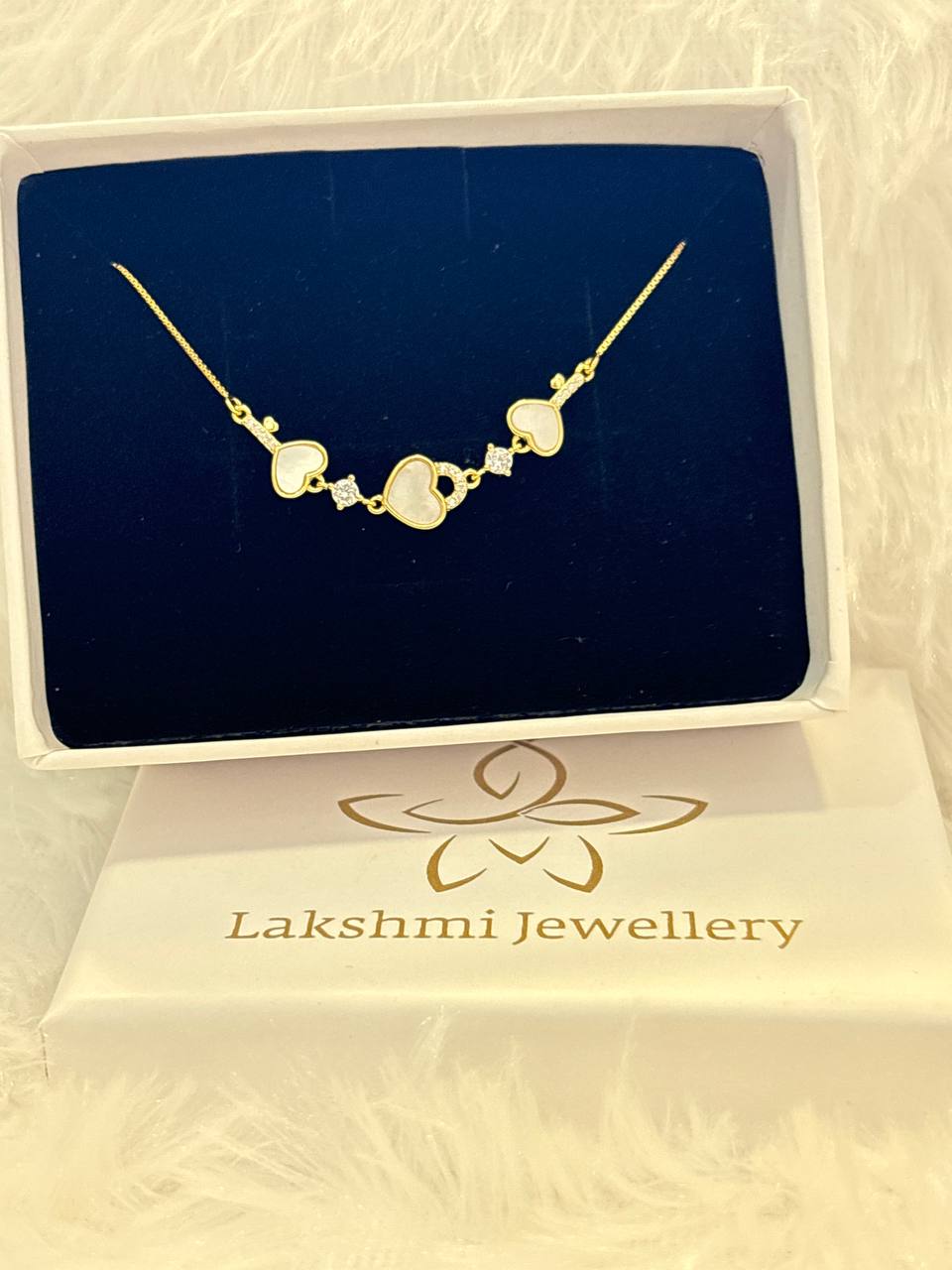 Silver triheart bracelet with gold finish